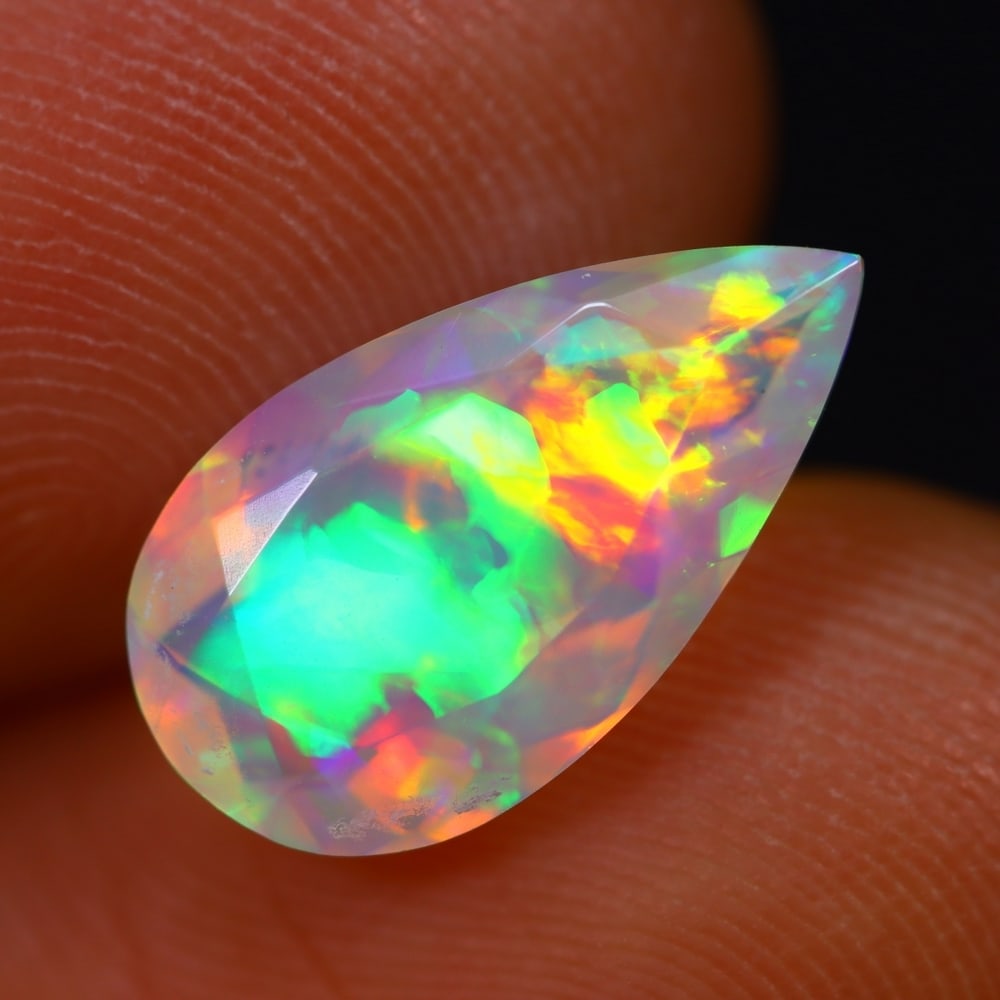 2.09Ct Welo Opal Polished - Ethiopian Opal - Pear Faceted , 558E: Ksmith Heritage Auctioneers Subject: Natural Ethiopian Welo Opal Origin: Ethiopia Carat Weight: 2.09Ct Dimension: 13.7 x 7.5 x 5.3 mm Treatment: Natural Untreated Shape: P