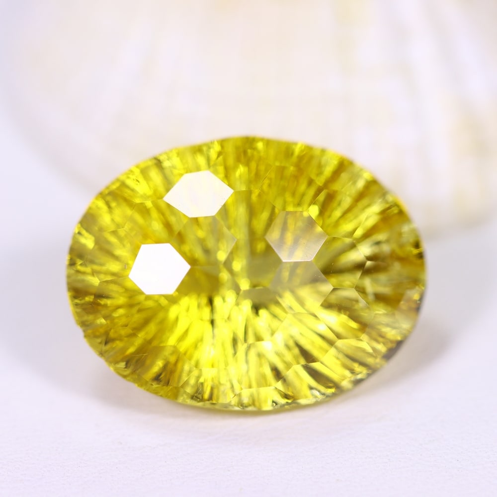 21.72Ct Citrine - Special Cut - Faceted Polished , 327E: Ksmith Heritage Auctioneers Subject: Natural Citrine Origin: Brazil Carat Weight: 21.72Ct Dimension: 21.7x16.6x12.2 mm Treatment: Untreated Type: Faceted, Polished