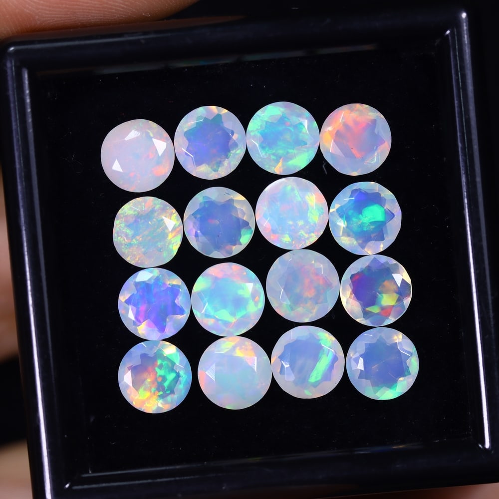 *8.75Ct 16pcs Calibrated 6x6mm Faceted Welo Opal Set - Ethiopian Opal , 473E: Ksmith Heritage Auctioneers Subject: Natural Ethiopian Welo Opal Origin: Ethiopia Carat Weight: 8.75Ct Treatment: Natural Untreated Type: Faceted, Polished