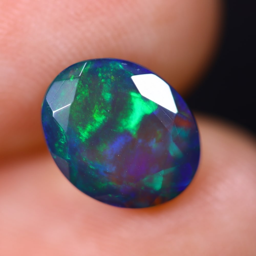 1.88Ct Welo Black Faceted Opal Polished - Ethiopian Opal , 488E: Ksmith Heritage Auctioneers Subject: Natural Ethiopian Welo Black Opal Origin: Ethiopia Carat Weight: 1.88Ct Dimension: 9.9x8x5.5 mm Treatment: Smoked Type: Faceted, Polis