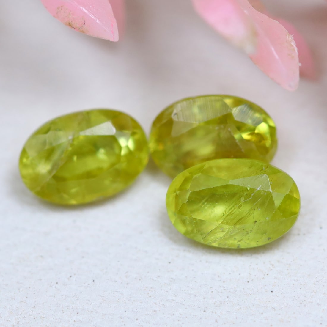 Sphene 1.32Ct Natural Oval Cut Unheated Yellowish Green Sphene Lot, 424MZ: Ksmith Jewels Global Welcome to our auction house, today auction brought to you by Ksmith Jewels Global based in Penang, Malaysia specialize in all kinds of opal and color gemstone both in manufacturi