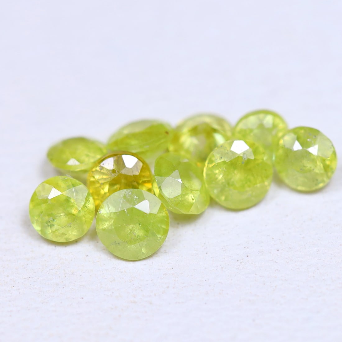 1.25Ct Natural Unheated Yellowish Green Round Madagascar Sphene (OT7002), 591A: Ksmith Jewels Global Welcome to our auction house, today auction brought to you by Ksmith Jewels Global based in Penang, Malaysia specialize in all kinds of opal and color gemstone both in manufacturi