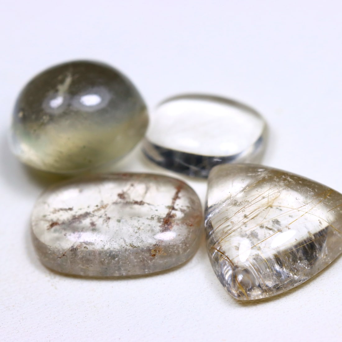 25.90 CT. Unheated 4Pcs Colorless Phantom Quartz Africa Mix Sharp Cabochon, 535B: Ksmith Jewels Global Welcome to our auction house, today auction brought to you by Ksmith Jewels Global based in Penang, Malaysia specialize in all kinds of opal and color gemstone both in manufacturi