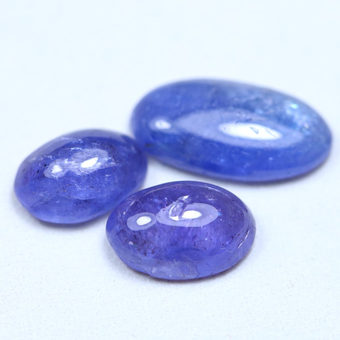 6.62Cts Natural Tanzanite Smooth Cabochon for Jewelry Making in Lot OT6948, 859A: Ksmith Jewels Global Welcome to our auction house, today auction brought to you by Ksmith Jewels Global based in Penang, Malaysia specialize in all kinds of opal and color gemstone both in manufacturi