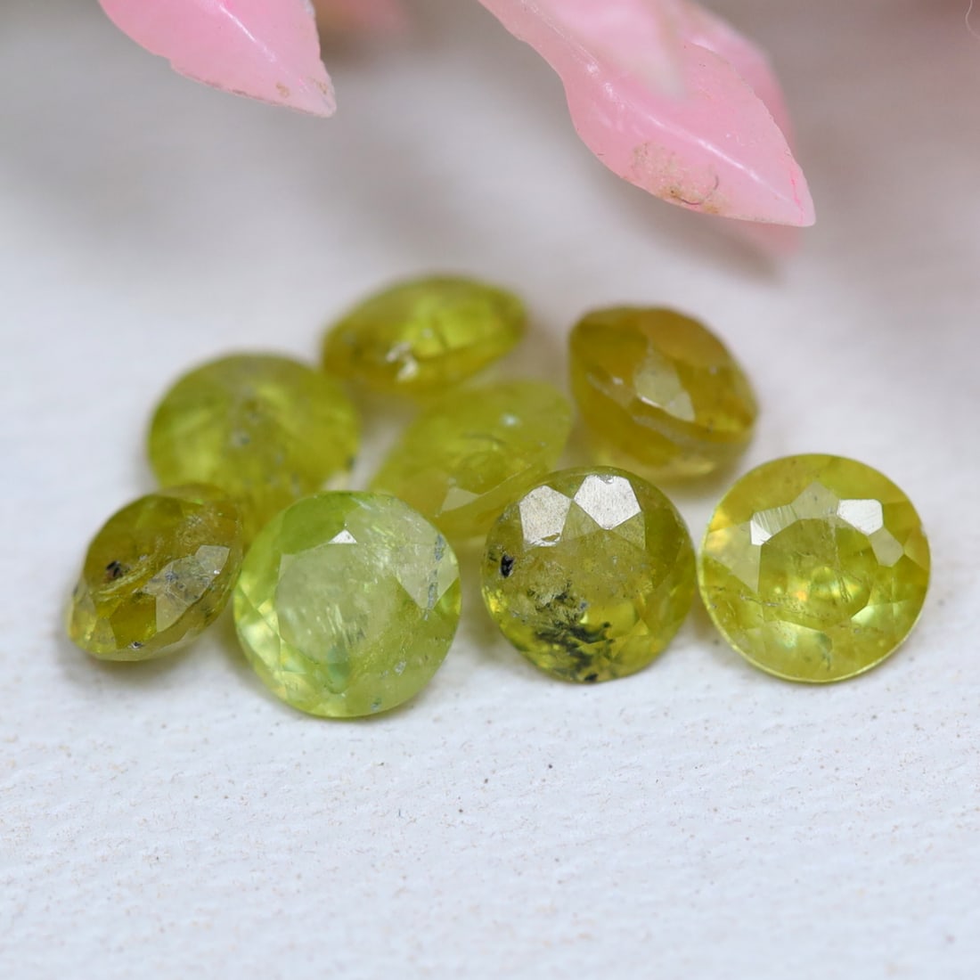 Sphene 1.30Ct Natural Round Cut Unheated Yellowish Green Sphene Lot, 936MZ: Ksmith Jewels Global Welcome to our auction house, today auction brought to you by Ksmith Jewels Global based in Penang, Malaysia specialize in all kinds of opal and color gemstone both in manufacturi