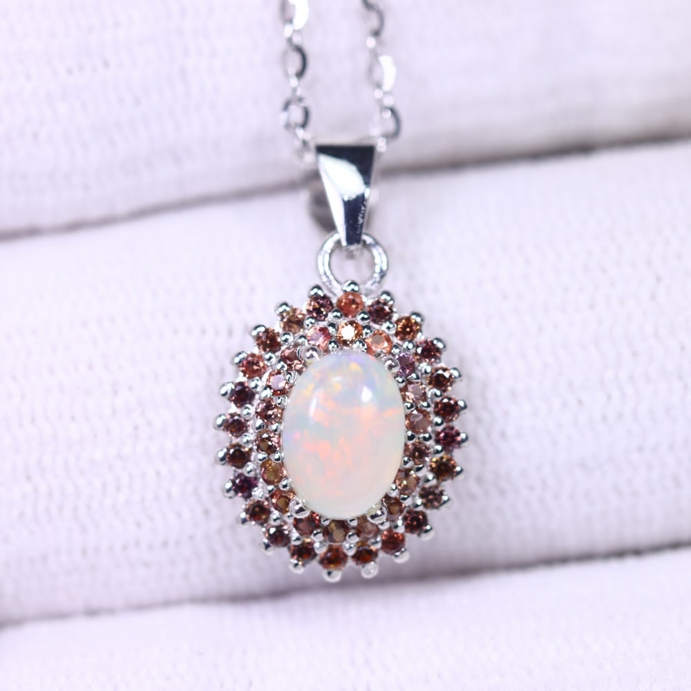 18inches Necklace Fire Opal & Sapphire - 925 Sterling Silver , 22E: Ksmith Heritage Auctioneers Subject: Natural Fire Opal & Sapphire Origin: Thailand Carat Weight: 2.25g Dimension: Gemstone 5x7mm Type: Necklace