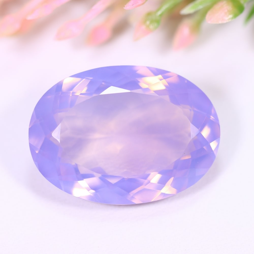 21.76Ct Lavender Amethyst - Polished Faceted , 111E: Ksmith Heritage Auctioneers Subject: Natural Lavender Amethyst Origin: Brazil Carat Weight: 21.76Ct Dimension: 23.2x16.9x8.8 mm Treatment: Untreated Type: Faceted, Polishe