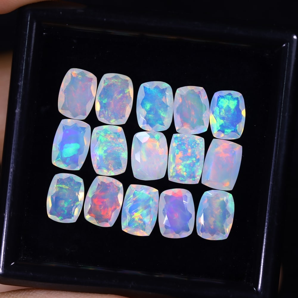 *8.41Ct 15pcs Calibrated 7x5mm Faceted Welo Opal Set - Ethiopian Opal , 304E: Ksmith Heritage Auctioneers Subject: Natural Ethiopian Welo Opal Origin: Ethiopia Carat Weight: 8.41Ct Treatment: Natural Untreated Type: Faceted, Polished