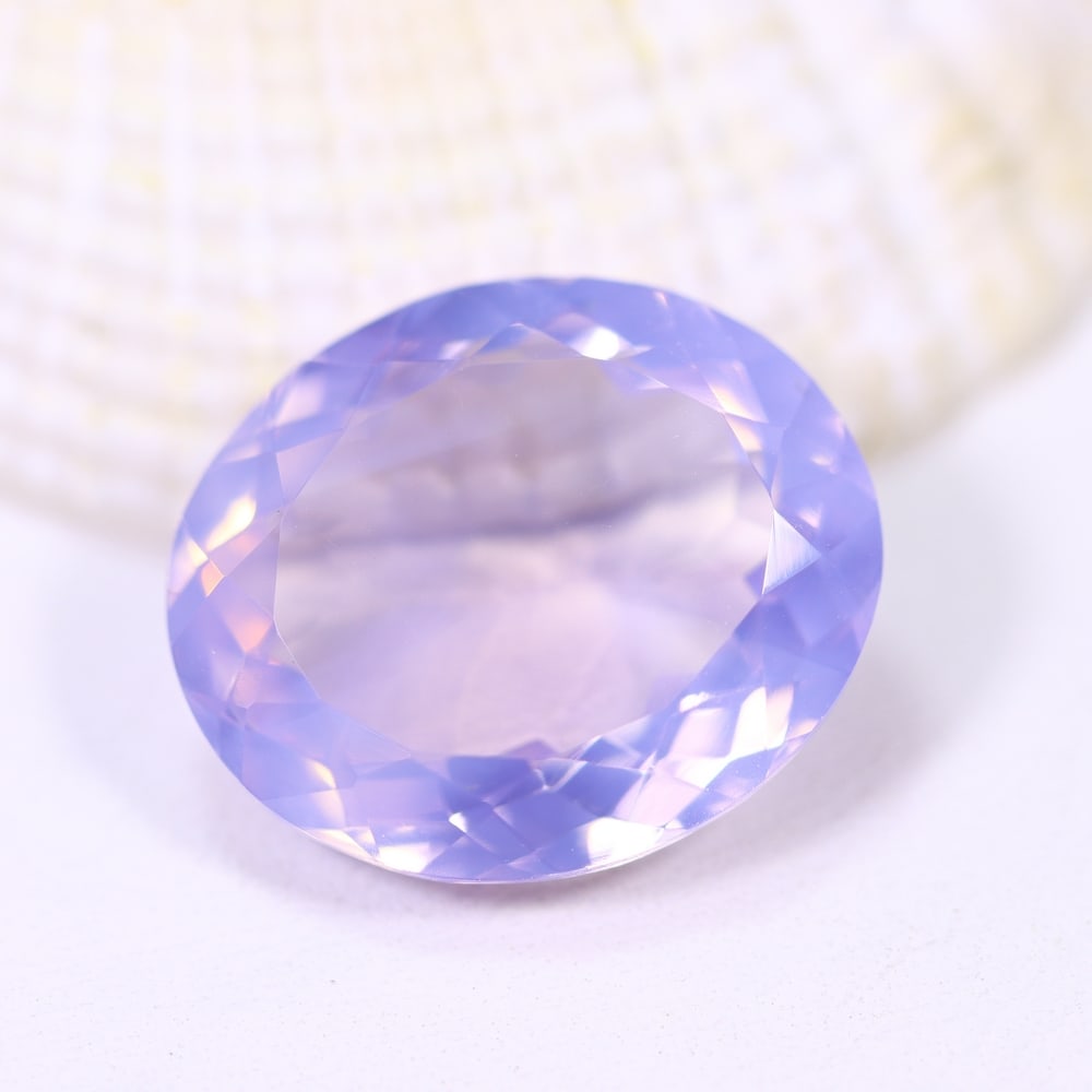 10.66Ct Lavender Amethyst - Polished Faceted , 992E: Ksmith Heritage Auctioneers Subject: Natural Lavender Amethyst Origin: Brazil Carat Weight: 10.66Ct Dimension: 17x14.4x7.1 mm Treatment: Untreated Type: Faceted, Polished<