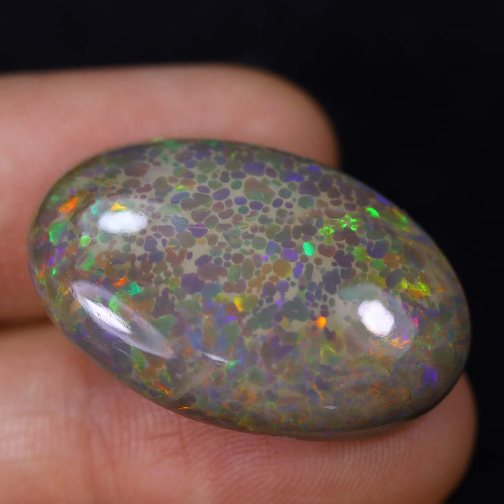 *15.64Ct Welo Opal Polished - Ethiopian Opal, 538B: Ksmith Heritage Auctioneers Subject: Natural Ethiopian Welo Opal Origin: Ethiopia Carat Weight: 15.64Ct Dimension: 27.6x17.8x6.6 mm Treatment: Natural Untreated Type: Cabochon,