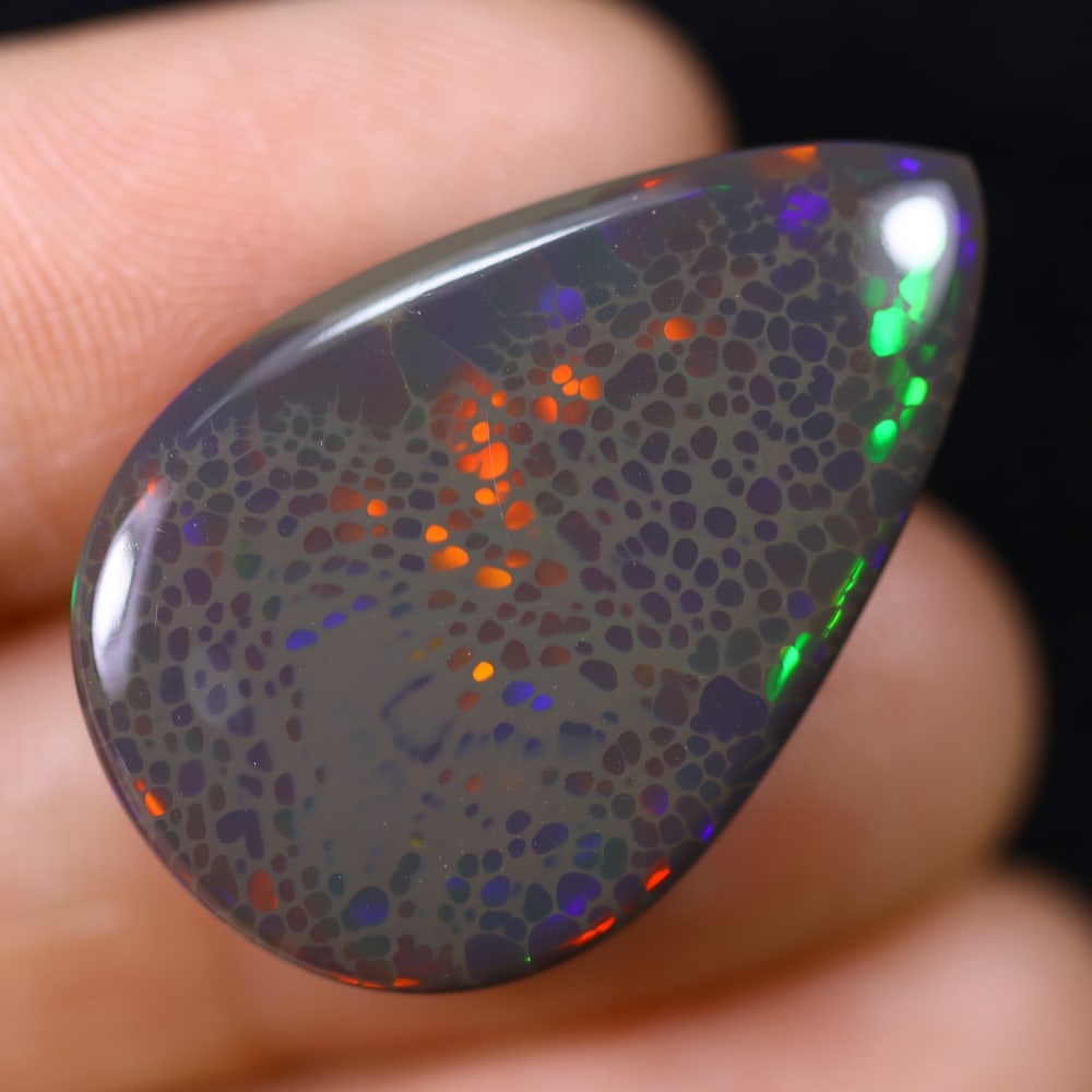 *14.86Ct Unheated Welo Opal Polished - Ethiopian Opal, 1250B: Ksmith Heritage Auctioneers Subject: Natural Ethiopian Welo Opal Origin: Ethiopia Carat Weight: 14.86Ct Dimension: 29x18.8x5.5 mm Treatment: Natural Untreated Type: Cabochon,