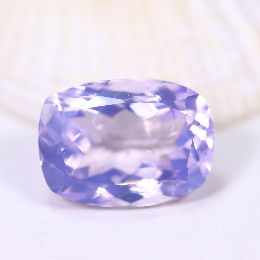 11.91Ct Lavender Amethyst - Polished Faceted , 240E: Ksmith Heritage Auctioneers Subject: Natural Lavender Amethyst Origin: Brazil Carat Weight: 11.91Ct Dimension: 16.9x12.3x8.9 mm Treatment: Untreated Type: Faceted, Polishe