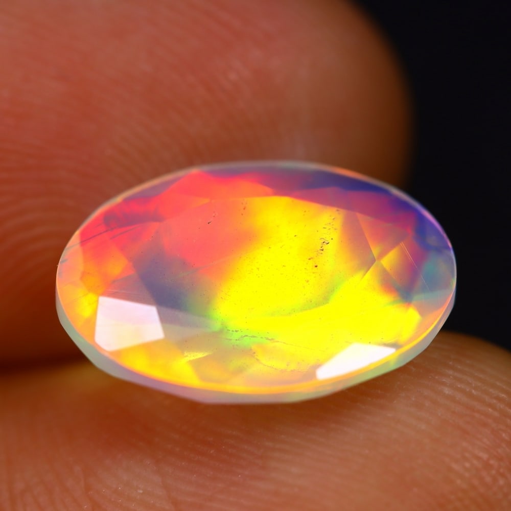 2.39Ct Welo Opal Polished - Ethiopian Opal - Oval Faceted , 376E: Ksmith Heritage Auctioneers Subject: Natural Ethiopian Welo Opal Origin: Ethiopia Carat Weight: 2.39Ct Dimension: 13.5 x 9.7 x 4.6 mm Treatment: Natural Untreated Shape: O
