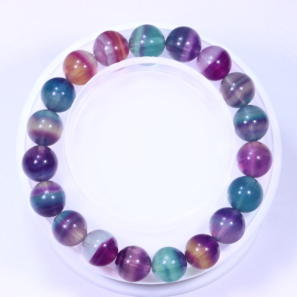 39.20g Fluorite Bracelet - Polished Beads , 756E: Ksmith Heritage Auctioneers Subject: Natural Fluorite Carat Weight: 39.20g