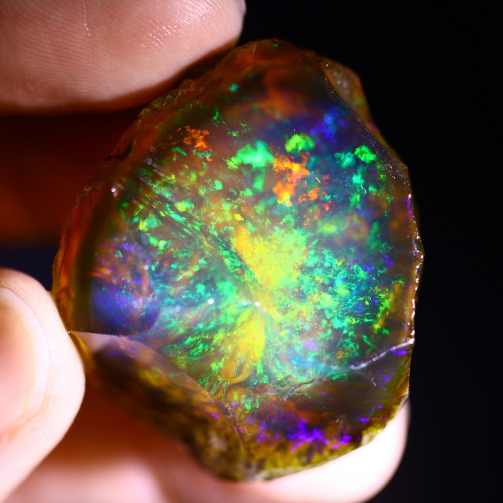 122.5cts Neon Flash Fire Ethiopian Crystal Specimen Rough , 1020E: Ksmith Heritage Auctioneers Subject: Natural Ethiopian Crystal Rough Origin: Ethiopia Carat Weight: 122.5 cts Dimension: 31x30x22 mm Treatment: Unheated Type: Rough Specim