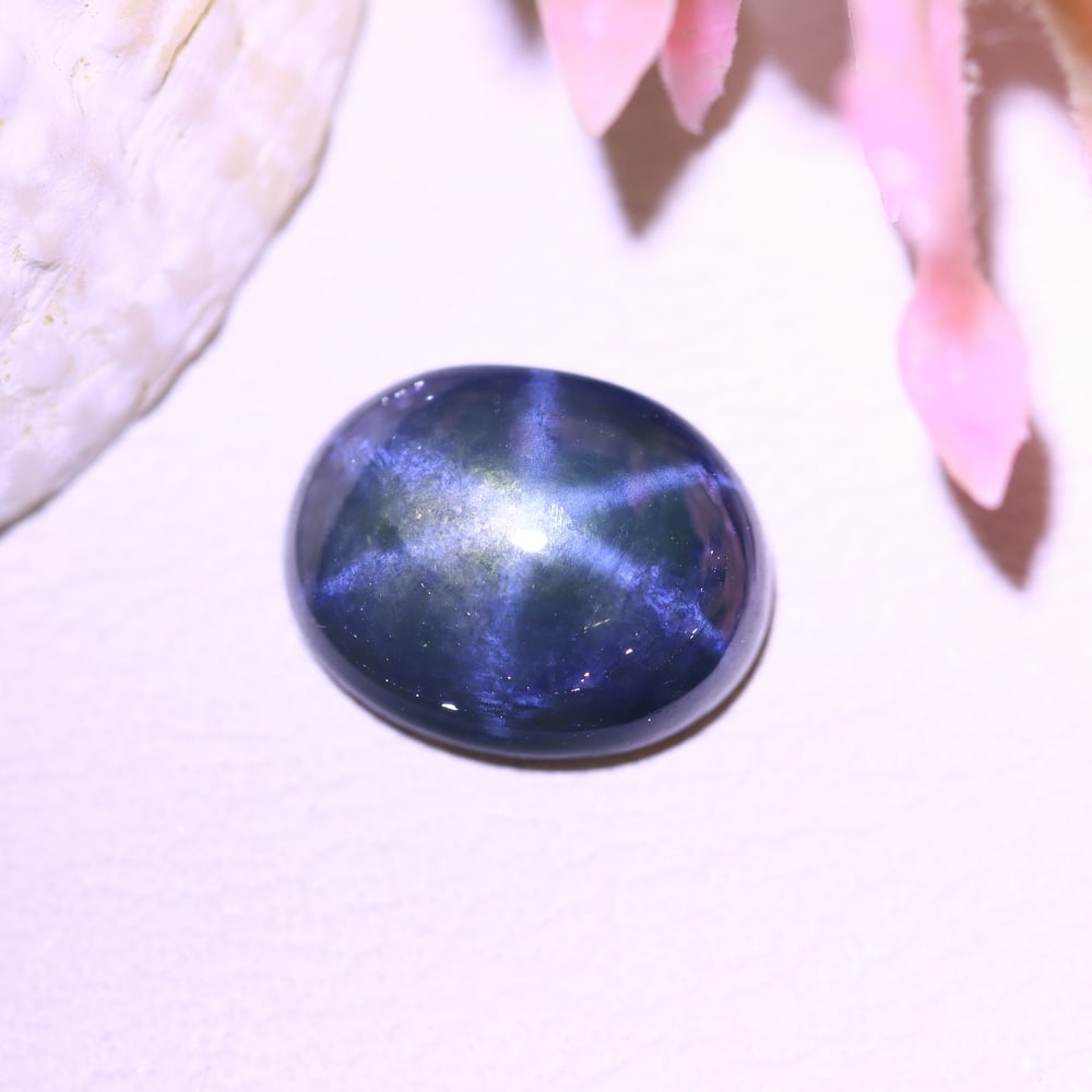 2.45Ct 6 Rays Blue Star Sapphire - Polished Cabochon , 981E: Ksmith Heritage Auctioneers Subject: Natural 6 Rays Star Sapphire Origin: Myanmar Carat Weight: 2.45Ct Dimension: 9x7.1x3.3 mm Treatment: Diffusion Type: Cabochon, Polishe