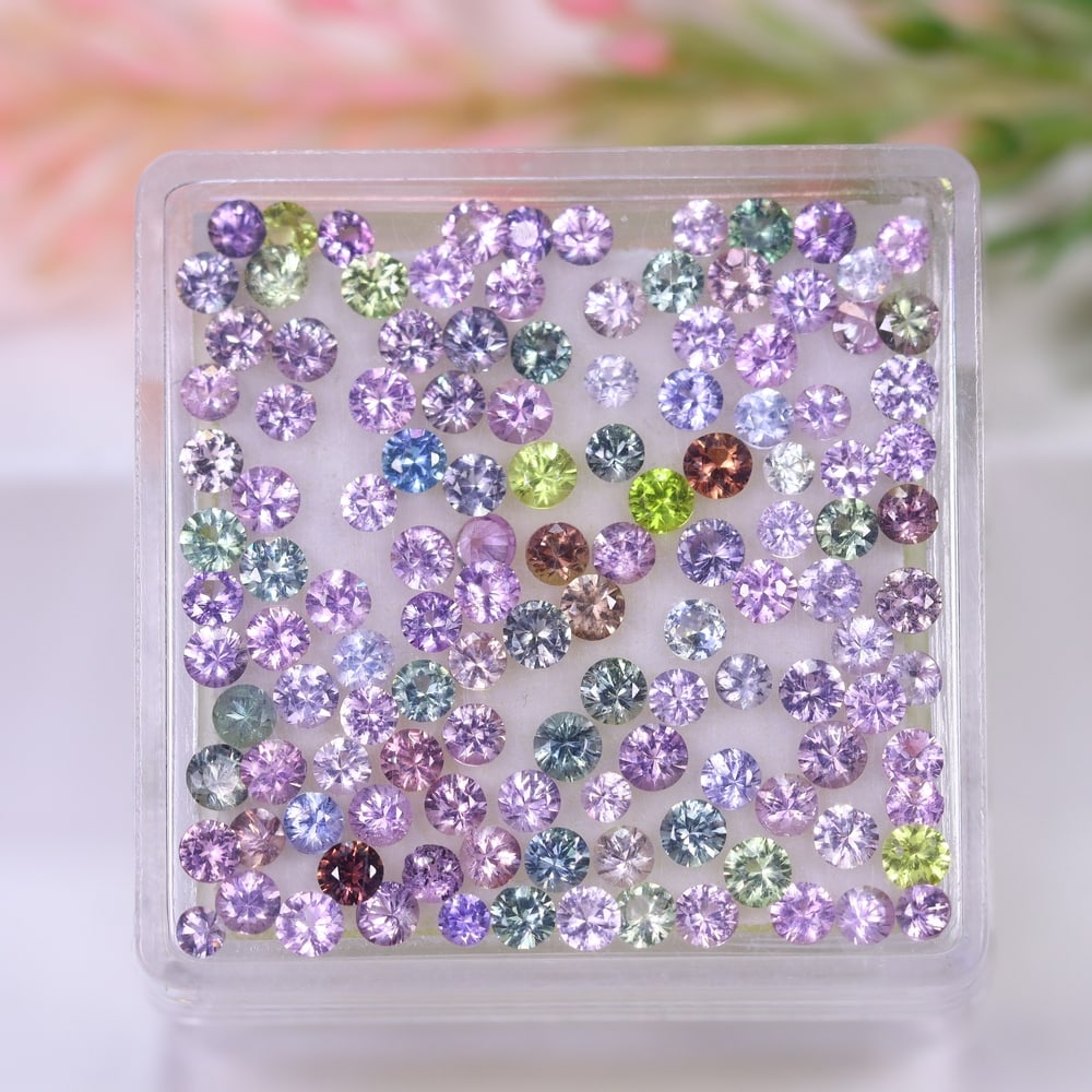 5.03Ct Fancy Sapphire Set - 2.0mm Round Diamond Cut , 1147E: Ksmith Heritage Auctioneers Subject: Natural Sapphire (Without box) Origin: Burma Dimension: 2x2x1.6 mm Treatment: Heated Shape: Round Type: Faceted, Polished