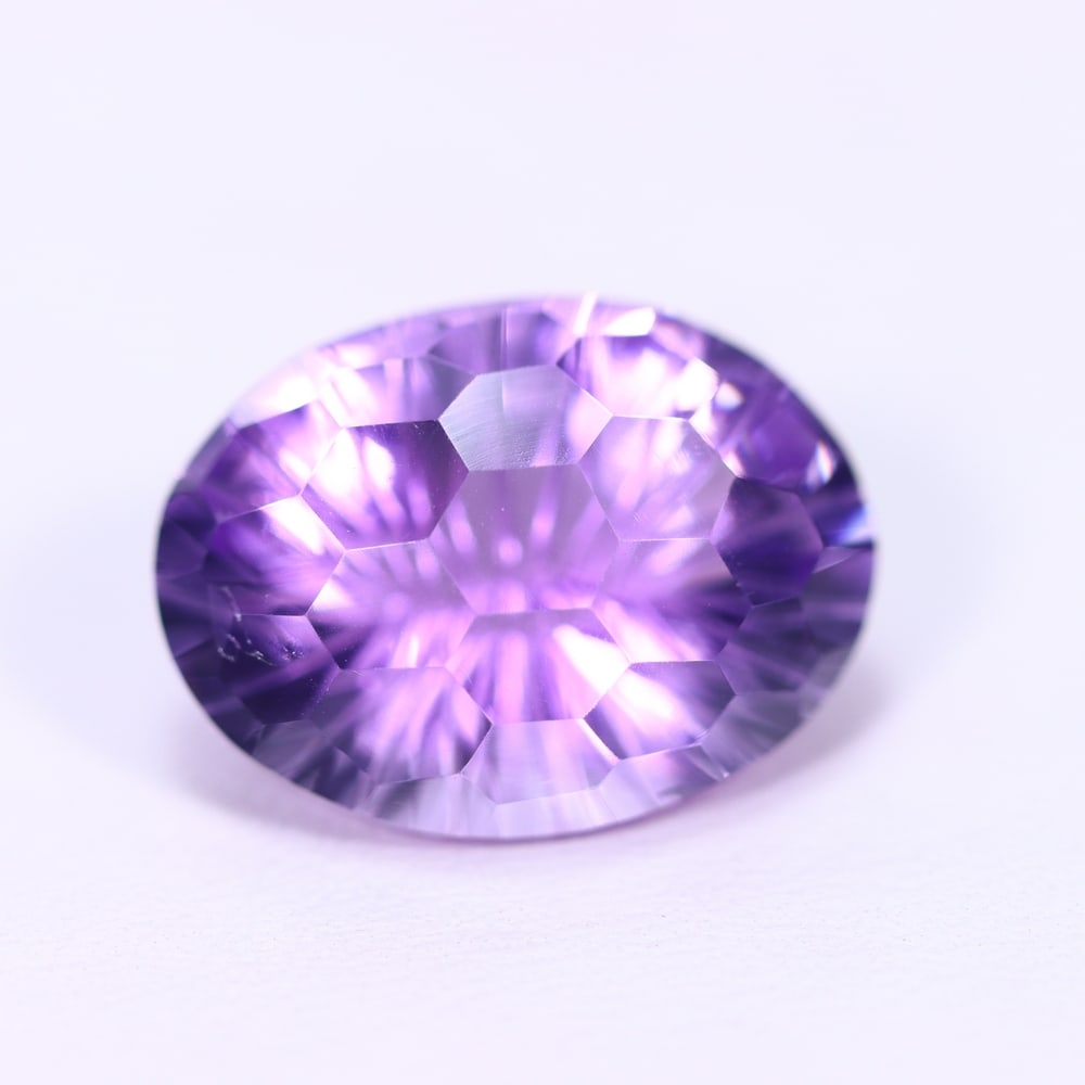 12.63Ct Purple Amethyst - Polished Faceted , 844E: Ksmith Heritage Auctioneers Subject: Natural Amethyst Origin: Brazil Carat Weight: 12.63Ct Dimension: 17.9x13.4x10.1 mm Treatment: Untreated Type: Faceted, Polished