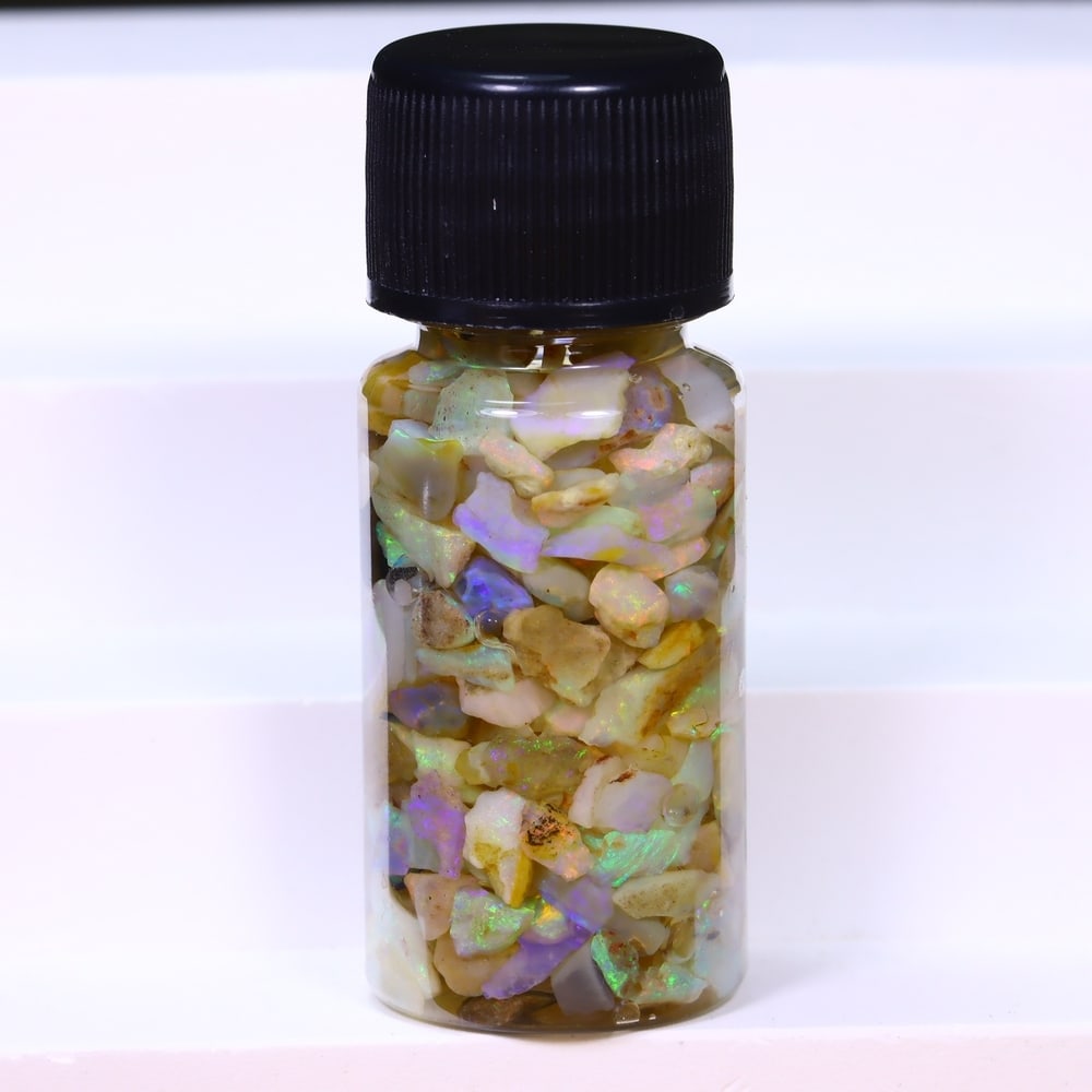 Australian Lightning Ridge Crystal Black Opal Rough Chip Jar (Good For Display), 190B: Ksmith Heritage Auctioneers Subject: Natural Australian Opal Origin: Australia Quantity: 1 Jar as photo