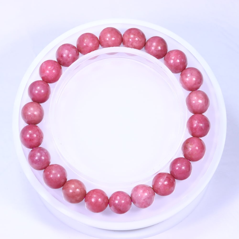 *28.20g Rhodonite Bracelet - Polished Beads , 303E: Ksmith Heritage Auctioneers Subject: Natural Rhodonite Carat Weight: 28.20g