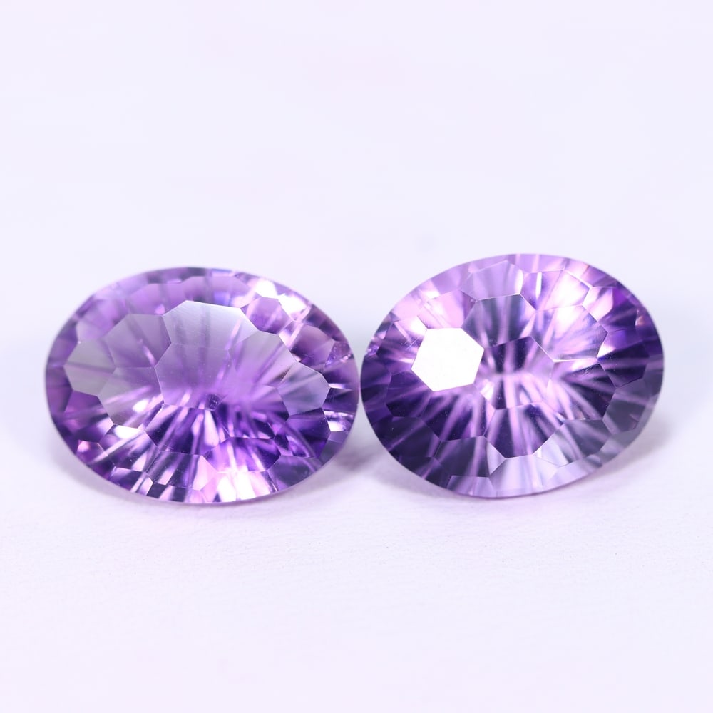18.27Ct Purple Amethyst Set - Polished Faceted , 791E: Ksmith Heritage Auctioneers Subject: Natural Amethyst Origin: Brazil Carat Weight: 18.27Ct Dimension: 15.7x12.3x9.6 mm Treatment: Untreated Type: Faceted, Polished