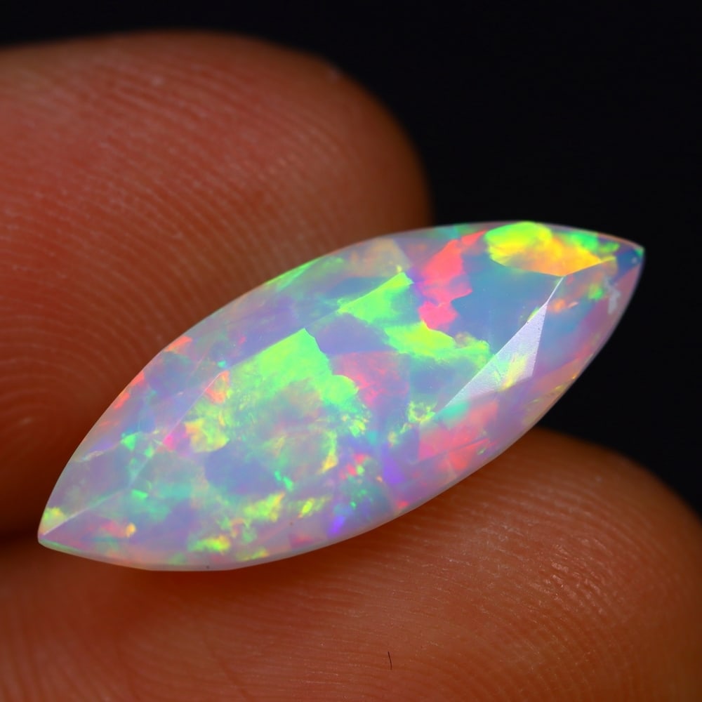 3.55Ct Welo Opal Polished - Ethiopian Opal - Marquise Faceted , 551E: Ksmith Heritage Auctioneers Subject: Natural Ethiopian Welo Opal Origin: Ethiopia Carat Weight: 3.55Ct Dimension: 20.1 x 8.2 x 5.5 mm Treatment: Natural Untreated Shape: M