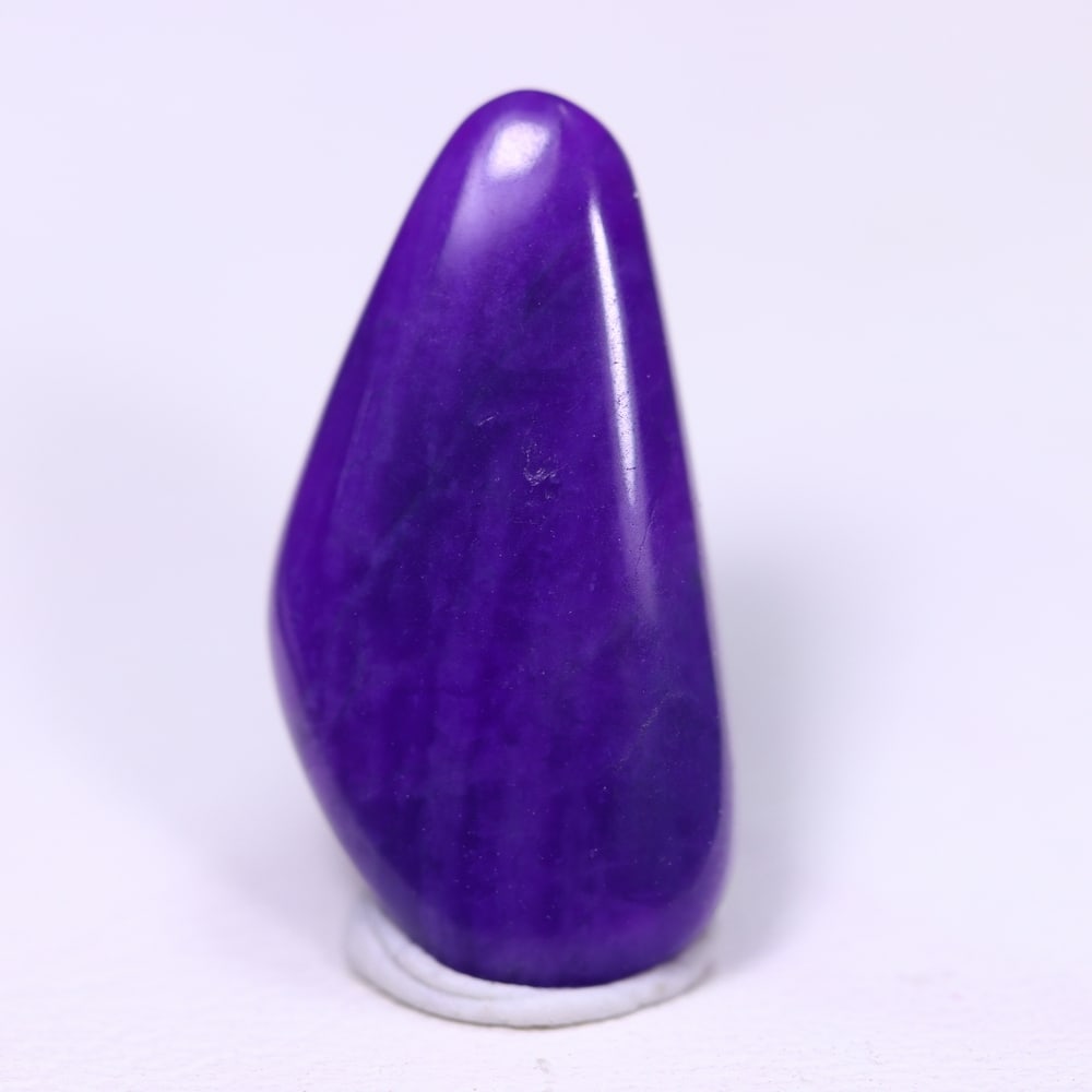 4.21cts Natural Rare Purple Sugilite Cabochon - No treated , 308E: Ksmith Heritage Auctioneers Subject: Natural Sugilite Origin: South Africa Carat Weight: 4.21Ct Dimension: 18.9x9.5x2.7 mm Treatment: No Treatment Type: Cabochon, Polished