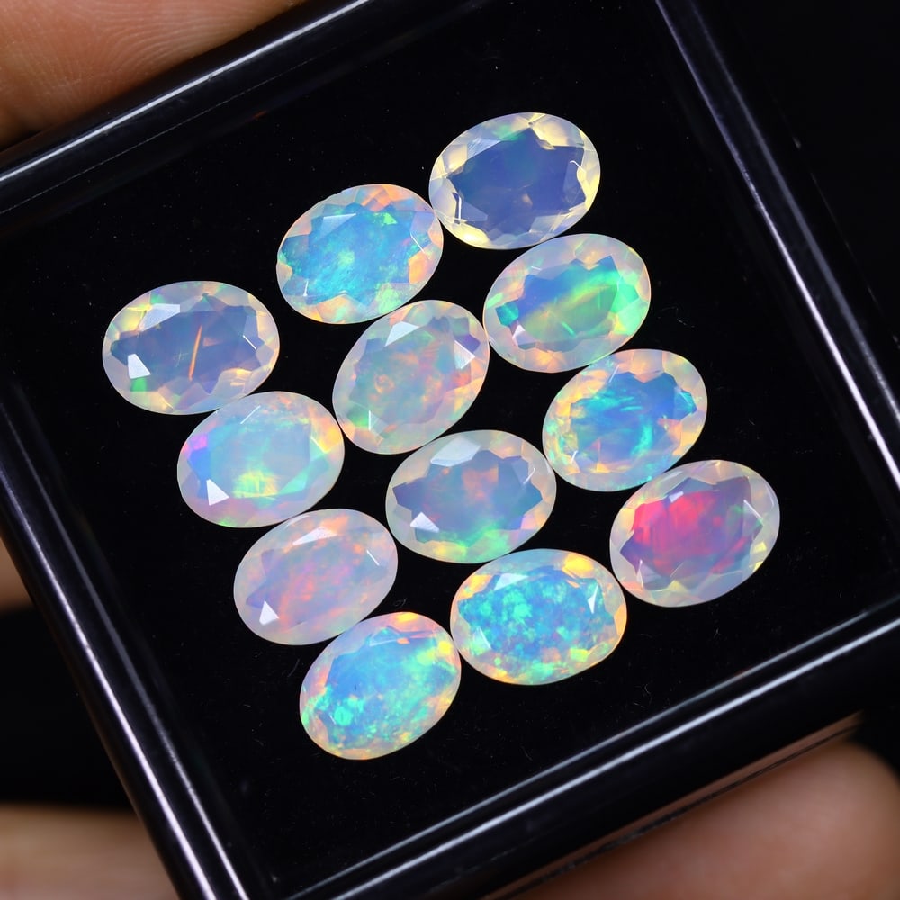 *8.86Ct 12pcs Calibrated 8x6mm Faceted Welo Opal Set - Ethiopian Opal, 727B: Ksmith Heritage Auctioneers Subject: Natural Ethiopian Welo Opal Origin: Ethiopia Carat Weight: 8.86Ct Treatment: Natural Untreated Type: Faceted, Polished