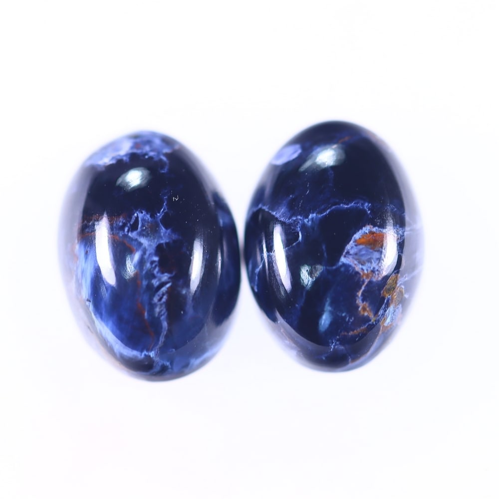 12.19Ct Pietersite Cabochon Pair - Gemstone Crystal - Oval Cabochon, 364B: Ksmith Heritage Auctioneers Subject: Natural Pietersite Origin: Namibia, South Africa Carat Weight: 12.19Ct Dimension: 14.1 x 10.1 x 5.3 mm Treatment: Natural Untreated Shape: