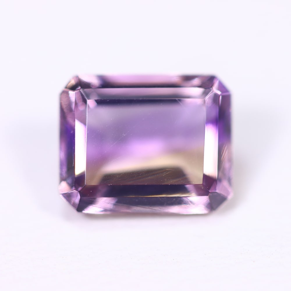 2.64Cts Bi-Colour Ametrine - Polished Faceted Cut , 657E: Ksmith Heritage Auctioneers Subject: Natural Ametrine Origin: Bolivia Carat Weight: 2.64Ct Dimension: 9x7.1x4.8 mm Treatment: Unheated Type: Faceted, Polished