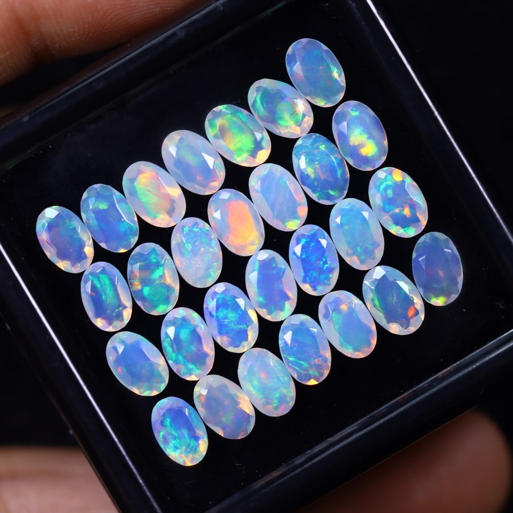 *8.26Ct 28pcs Calibrated 6x4mm Faceted Welo Opal Set - Ethiopian Opal, 1177B: Ksmith Heritage Auctioneers Subject: Natural Ethiopian Welo Opal Origin: Ethiopia Carat Weight: 8.26Ct Treatment: Natural Untreated Type: Faceted, Polished