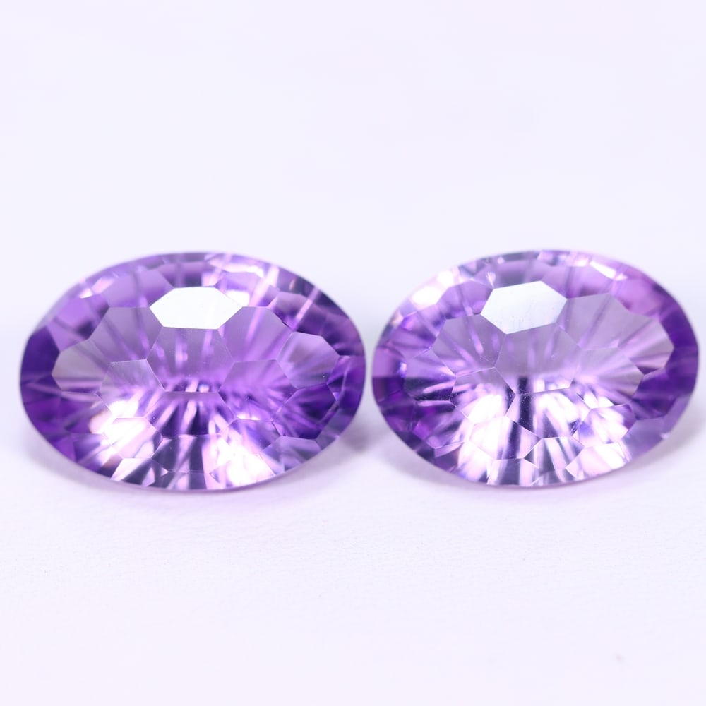 20.71Ct Purple Amethyst Set - Polished Faceted , 226E: Ksmith Heritage Auctioneers Subject: Natural Amethyst Origin: Brazil Carat Weight: 20.71Ct Dimension: 17.1x12.4x8.3 mm Treatment: Untreated Type: Faceted, Polished
