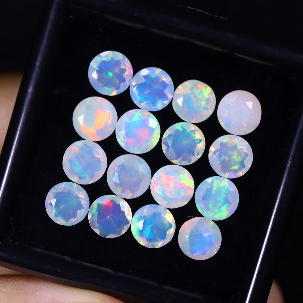 *8.29Ct 16pcs Calibrated 6x6mm Faceted Welo Opal Set - Ethiopian Opal , 589E: Ksmith Heritage Auctioneers Subject: Natural Ethiopian Welo Opal Origin: Ethiopia Carat Weight: 8.29Ct Treatment: Natural Untreated Type: Faceted, Polished