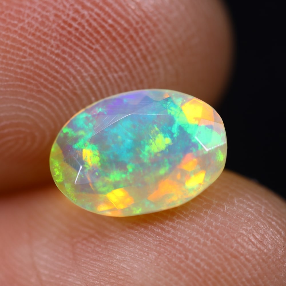 1.33Ct Welo Opal Faceted Polished - Ethiopian Opal , 676E: Ksmith Heritage Auctioneers Subject: Natural Ethiopian Welo Opal Origin: Ethiopia Carat Weight: 1.33Ct Dimension: 10.1x7.2x4 mm Treatment: Natural Untreated Type: Faceted,