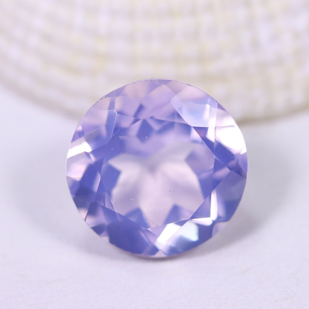 6.80Ct Lavender Amethyst - Polished Faceted , 1015E: Ksmith Heritage Auctioneers Subject: Natural Lavender Amethyst Origin: Brazil Carat Weight: 6.80Ct Dimension: 12.5x12.5x7.9 mm Treatment: Untreated Type: Faceted, Polished