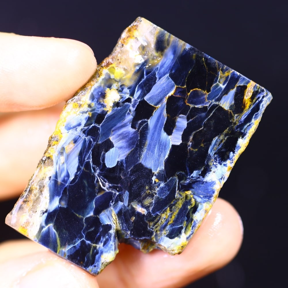 82.81Ct Pietersite Slab - Gemstone Crystal - Freeform Slice, 928B: Ksmith Heritage Auctioneers Subject: Natural Pietersite Origin: Namibia, South Africa Carat Weight: 82.81Ct Dimension: 43.7 x 30.9 x 5.7 mm Treatment: Natural Untreated Shape: