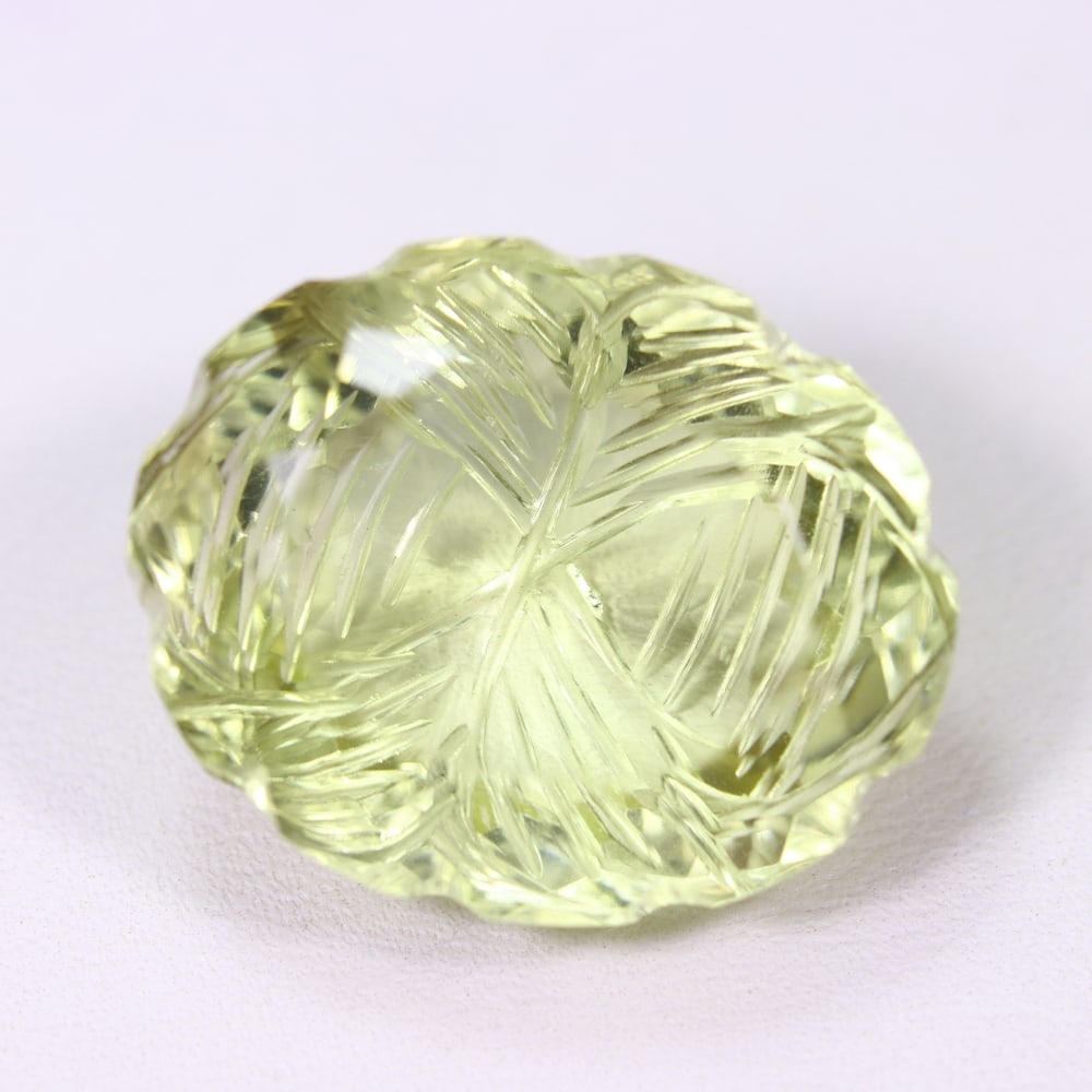 29.82Ct Lemon Carving Quartz - Polished Carving, 1229B: Ksmith Heritage Auctioneers Subject: Natural Lemon Quartz Origin: Brazil Carat Weight: 29.82Ct Dimension: 22.7x18.4x11.8 mm Treatment: Untreated Type: Carving, Polished
