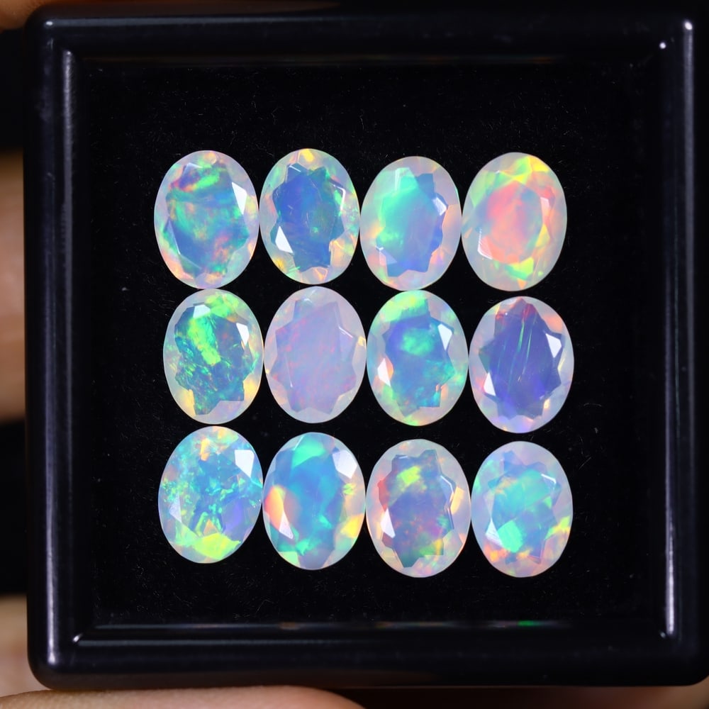 *9.00Ct 12pcs Calibrated 8x6mm Faceted Welo Opal Set - Ethiopian Opal, 166B: Ksmith Heritage Auctioneers Subject: Natural Ethiopian Welo Opal Origin: Ethiopia Carat Weight: 9.00Ct Treatment: Natural Untreated Type: Faceted, Polished