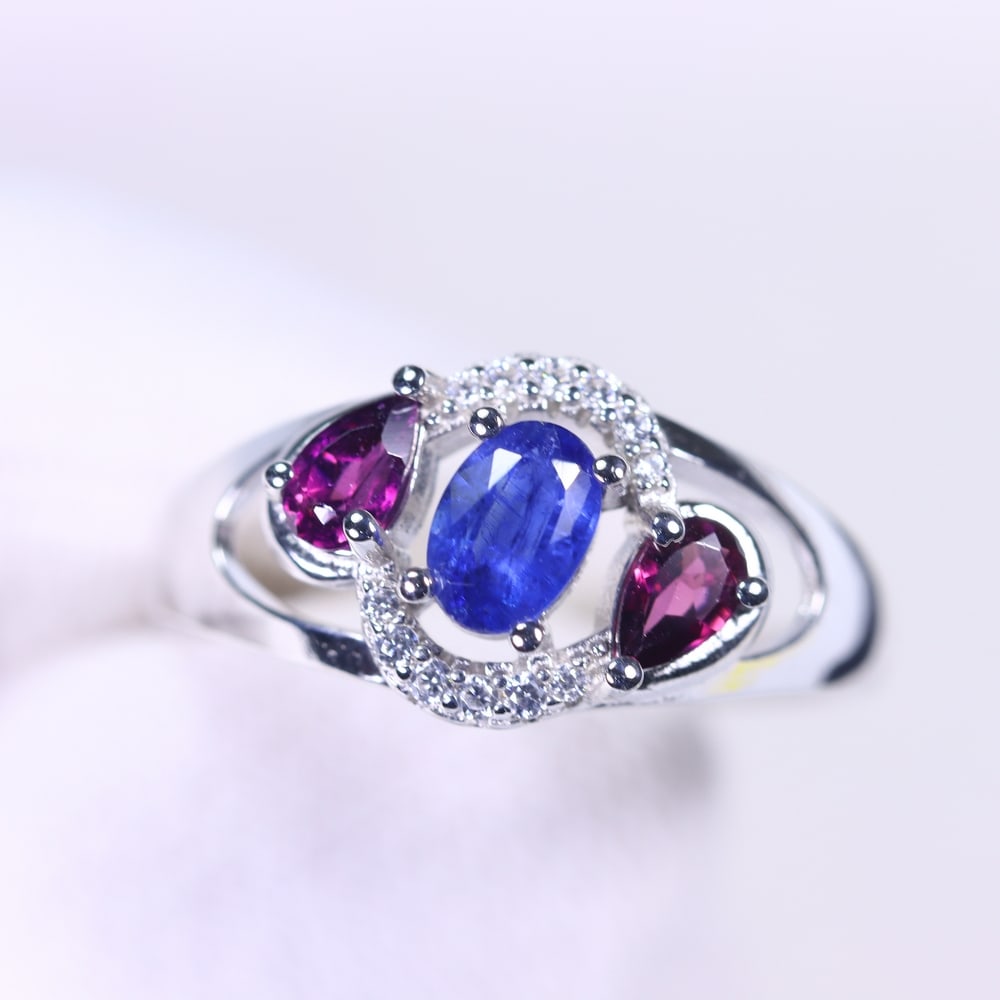 Ring US8 Kyanite Zircon & Rhodolite - 925 Sterling Silver , 729E: Ksmith Heritage Auctioneers Subject: Natural Kyanite, Zircon & Rhodolite Origin: Thailand Carat Weight: 17.44ct Dimension: Gemstone 4x6mm Type: Ring