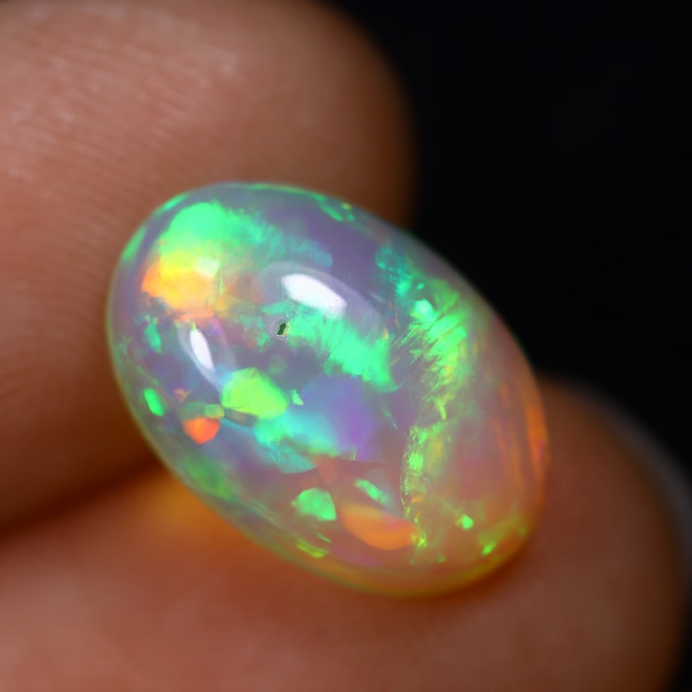3.50Ct Welo Opal Polished - Ethiopian Opal, 779B: Ksmith Heritage Auctioneers Subject: Natural Ethiopian Welo Opal Origin: Ethiopia Carat Weight: 3.50Ct Dimension: 14x9.6x5.4 mm Treatment: Natural Untreated Type: Cabochon, Pol