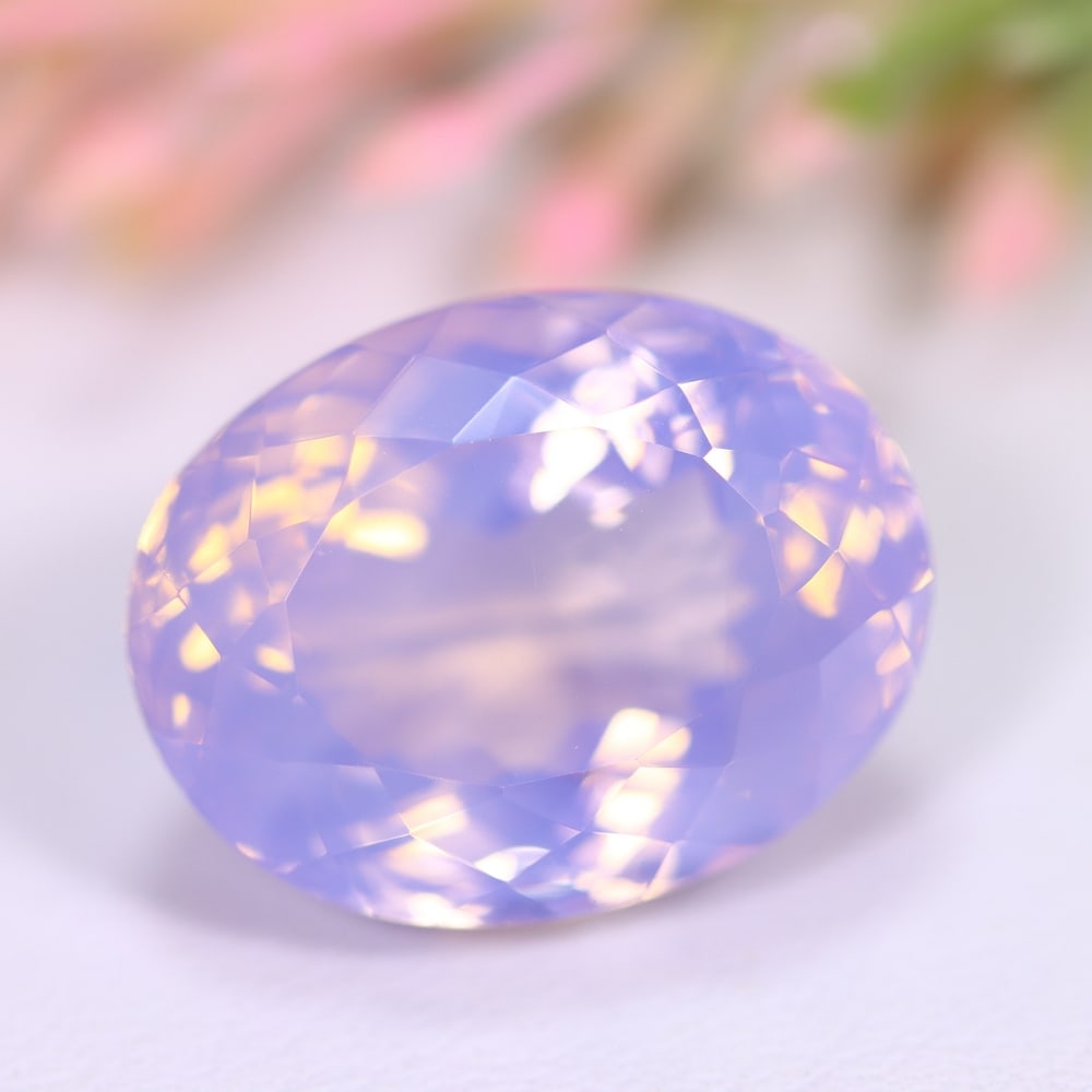 18.12Ct Lavender Amethyst - Polished Faceted , 309E: Ksmith Heritage Auctioneers Subject: Natural Lavender Amethyst Origin: Brazil Carat Weight: 18.12Ct Dimension: 18.6x14.4x11.2 mm Treatment: Untreated Type: Faceted, Polish