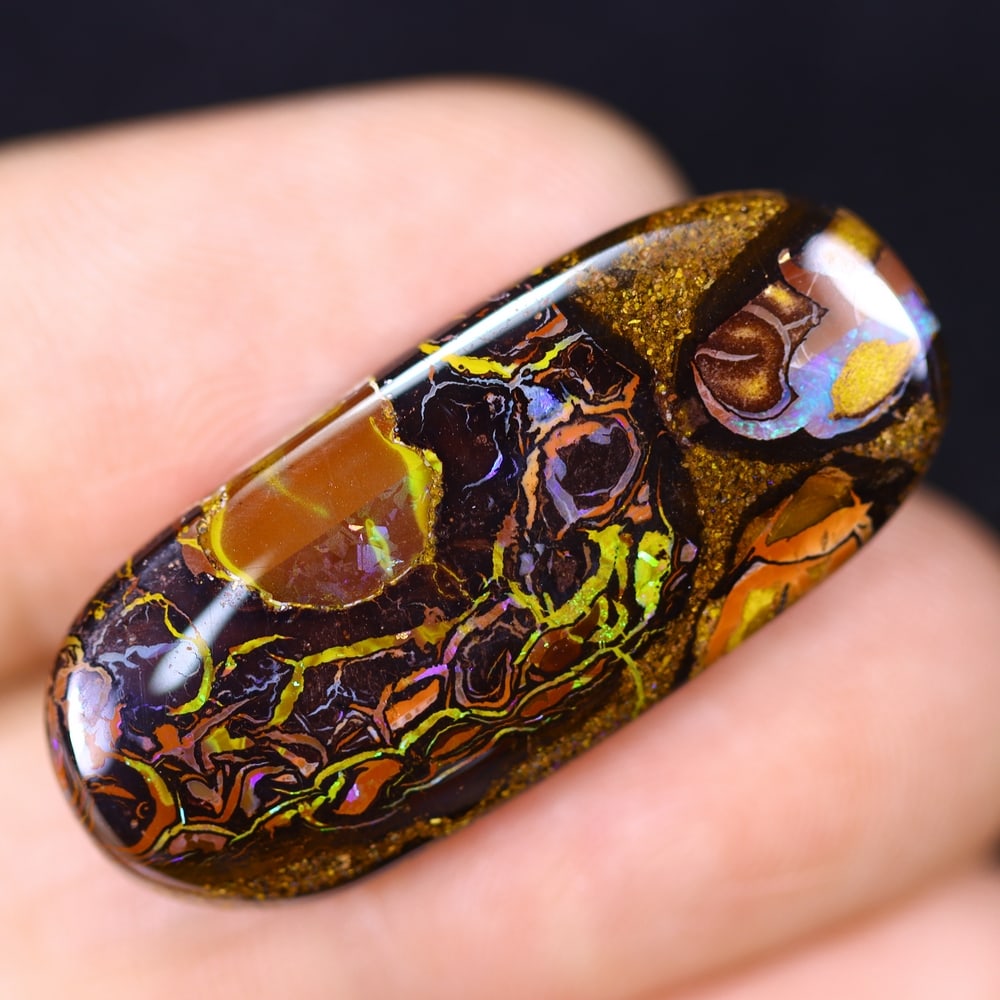 18.56Ct Boulder Opal - Australian Opal, 129B: Ksmith Heritage Auctioneers Subject: Natural Boulder Opal Origin: Australia Carat Weight: 18.56Ct Dimension: 29.8x13x4.2 mm Treatment: Natural Untreated Type: Cabochon, Polishe
