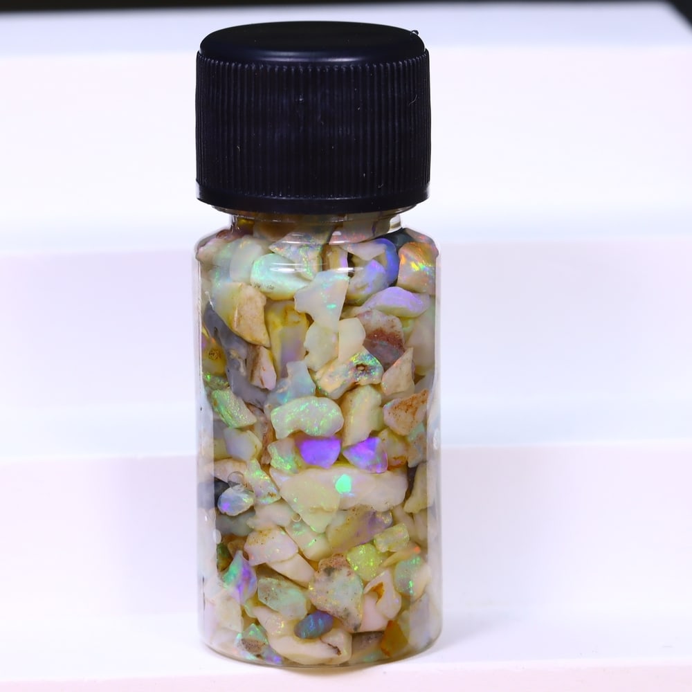 Australian Lightning Ridge Crystal Black Opal Rough Chip Jar (Good For Display), 711B: Ksmith Heritage Auctioneers Subject: Natural Australian Opal Origin: Australia Quantity: 1 Jar as photo