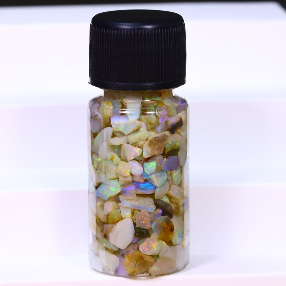 Australian Lightning Ridge Crystal Black Opal Rough Chip Jar (Good For Display), 607B: Ksmith Heritage Auctioneers Subject: Natural Australian Opal Origin: Australia Quantity: 1 Jar as photo