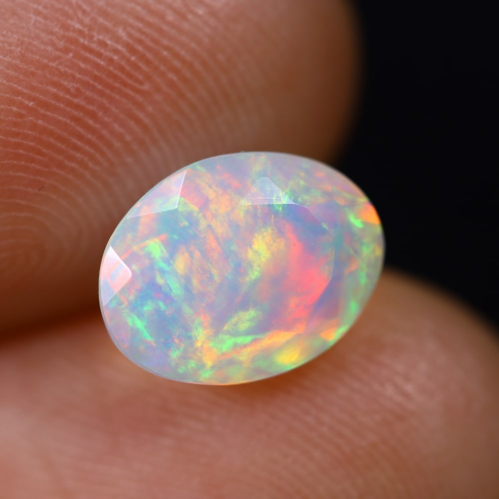 1.53Ct Welo Opal Faceted Polished - Ethiopian Opal , 683E: Ksmith Heritage Auctioneers Subject: Natural Ethiopian Welo Opal Origin: Ethiopia Carat Weight: 1.53Ct Dimension: 9.6x7.4x5 mm Treatment: Natural Untreated Type: Faceted,