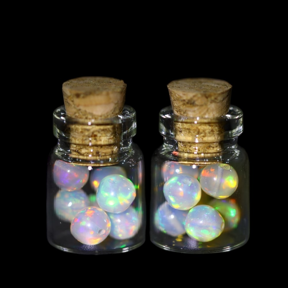 Twin Pack - 4.5mm Ethiopian Opal Ball in Display Jar - Bottle Size 1.5cm , 78C: Ksmith Heritage AuctioneersSubject: Natural Opal (with bottle) Origin: Ethiopia Treatment: Unheated