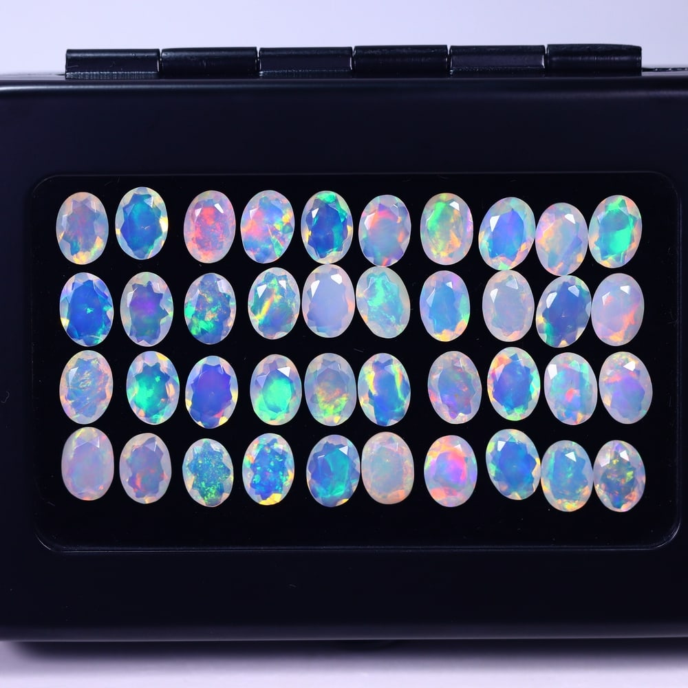 *19.15Ct Calibrated 7x5mm Faceted Welo Opal Set - Ethiopian Opal, 578B: Ksmith Heritage Auctioneers Subject: Natural Ethiopian Welo Opal Origin: Ethiopia Carat Weight: 19.15Ct Treatment: Natural Untreated Type: Faceted, Polished