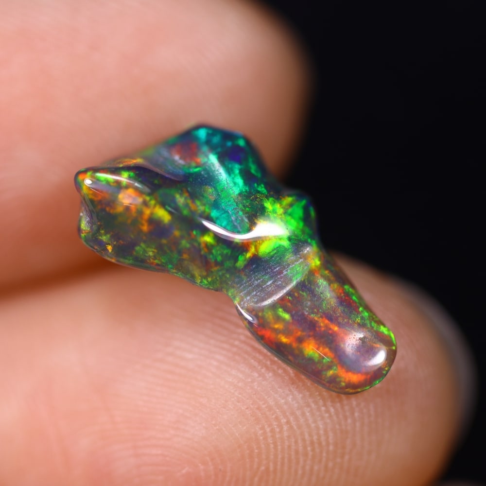 *1.78Ct Smoked Freeform Welo Opal Polished - Ethiopian Opal , 207C: Ksmith Heritage Auctioneers Subject: Natural Ethiopian Welo Opal Origin: Ethiopia Carat Weight: 1.78Ct Dimension: 14.4x8.4x4 mm Treatment: Smoked Type: Freeform, Polished<