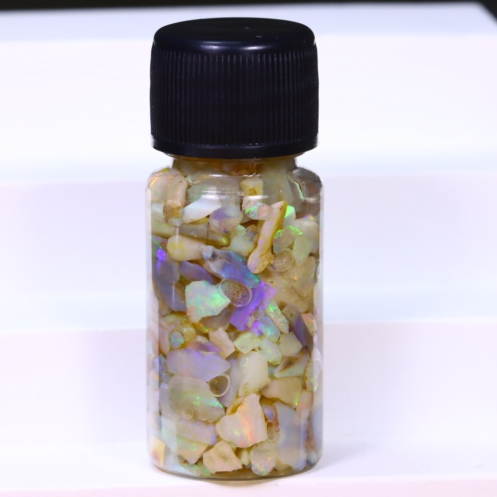Australian Lightning Ridge Crystal Black Opal Rough Chip Jar (Good For Display), 990B: Ksmith Heritage Auctioneers Subject: Natural Australian Opal Origin: Australia Quantity: 1 Jar as photo
