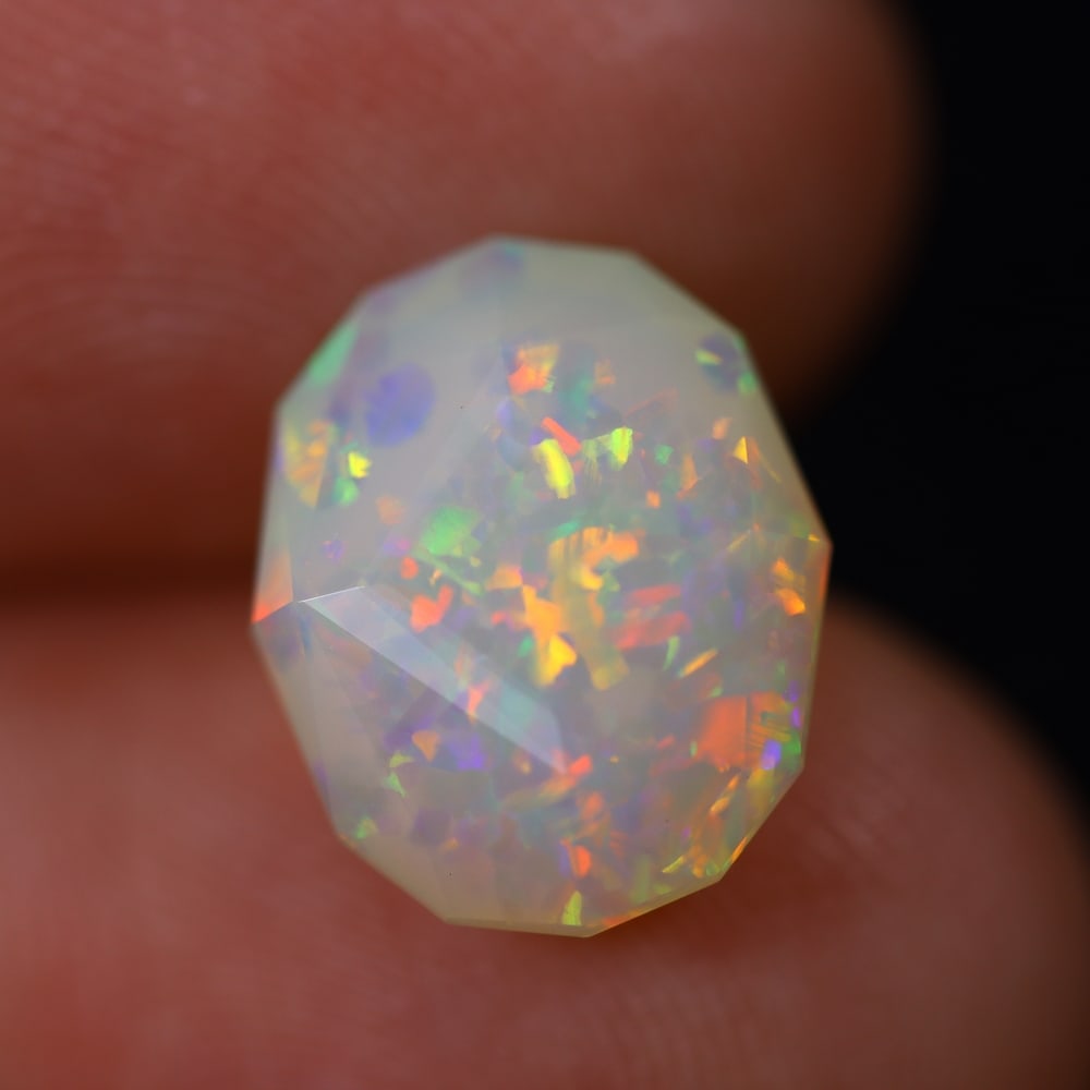 2.89Ct Special Cut Welo Opal Polished - Ethiopian Opal , 15E: Ksmith Heritage Auctioneers Subject: Natural Ethiopian Welo Opal Origin: Ethiopia Carat Weight: 2.89Ct Dimension: 12.4x10.1x5.6 mm Treatment: Unheated Type: Faceted, Polis